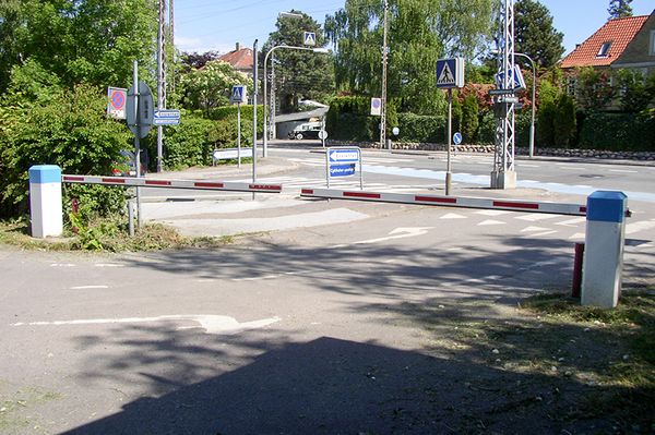 Regulering ved udkørslen med automatisk bom